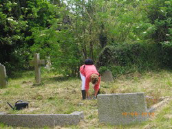 Yvonne Cleaning Henry Sollys grave, June 10th 2012